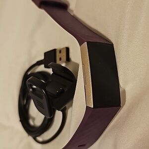 Purple fit bit 3 charge